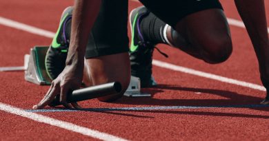 man on running field