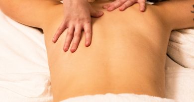 a woman getting a back massage at a spa