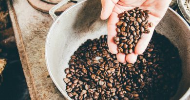 coffee beans on gray steel wok