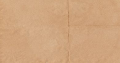 a piece of brown paper with a white background