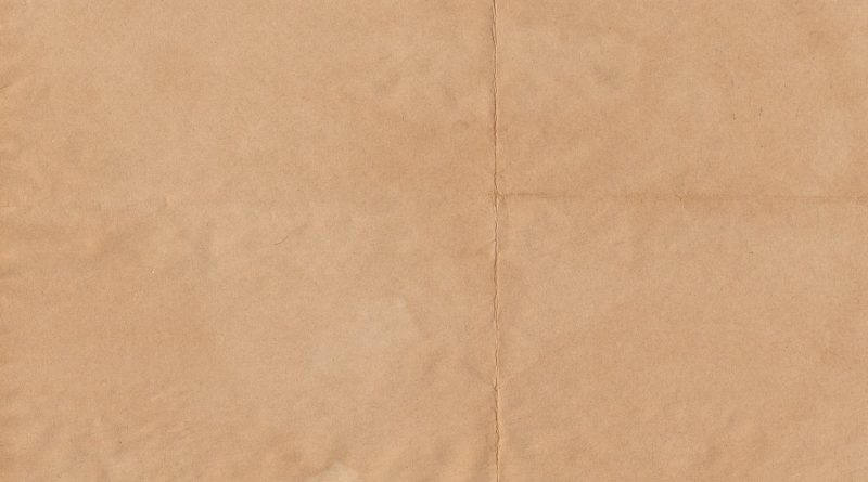 a piece of brown paper with a white background