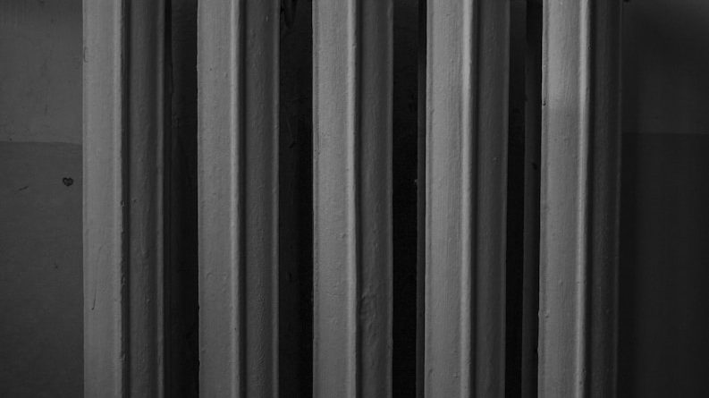 white radiator heater on white wall