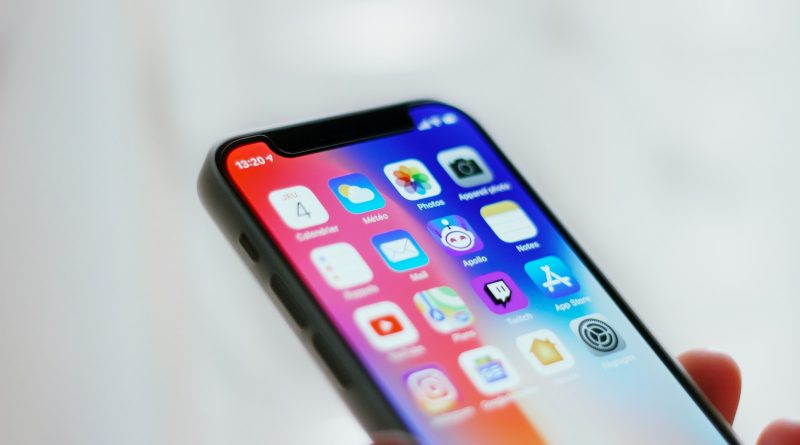 person holding black iphone 4