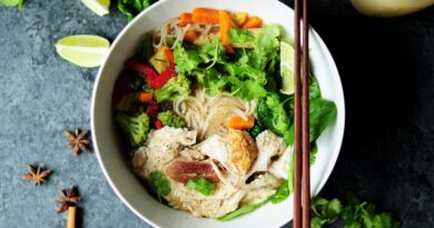 brown chopsticks on white bowl