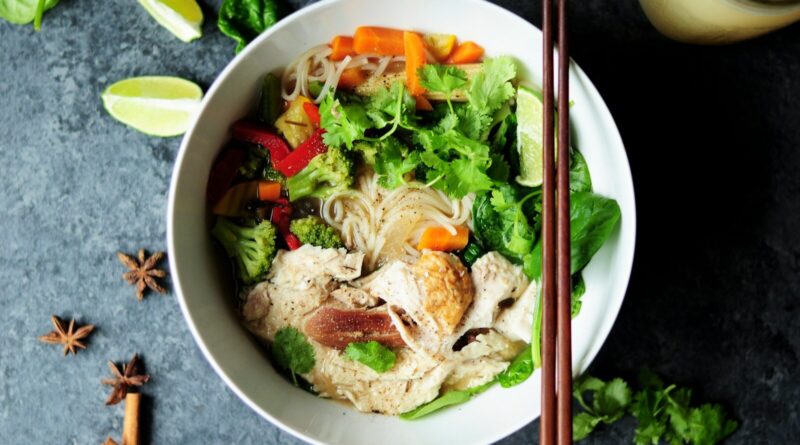 brown chopsticks on white bowl